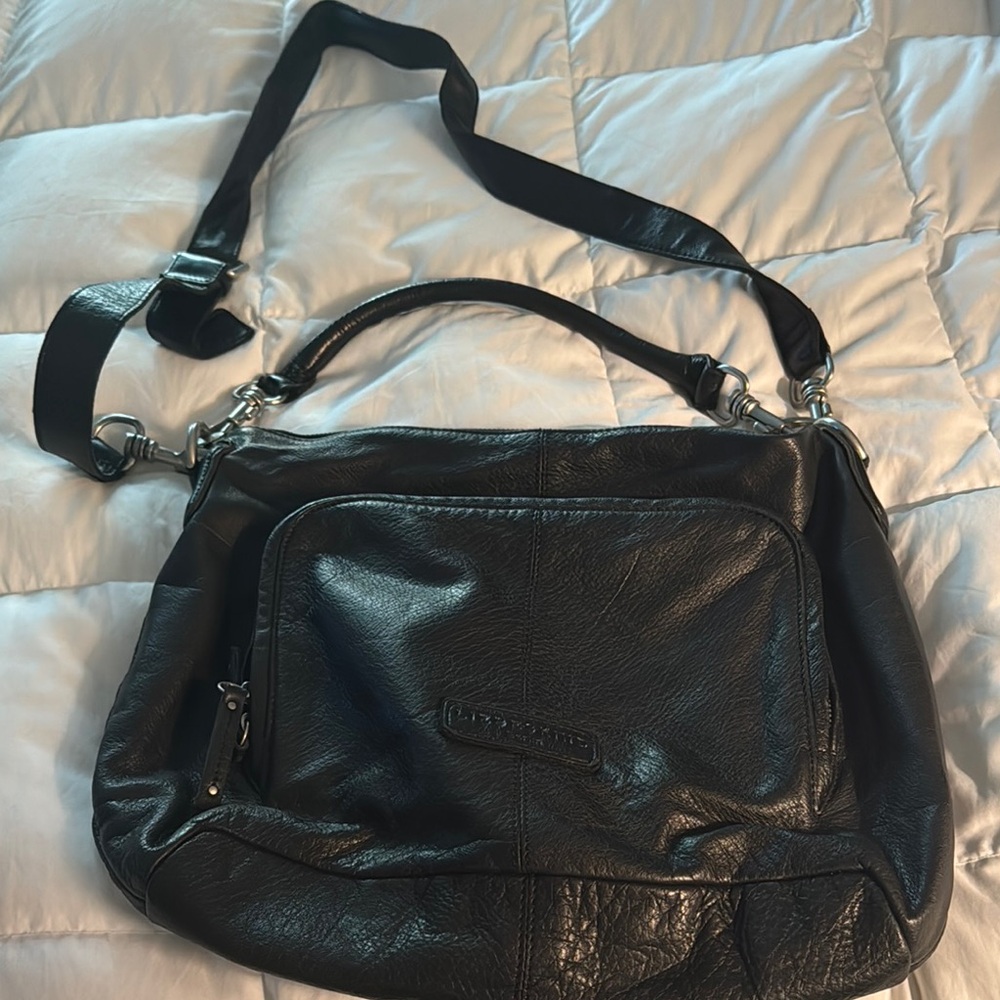 Versatile Black Leather Shoulder Bag with Adjustable Strap